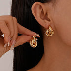 Gold Earrings with Intertwined Knots 